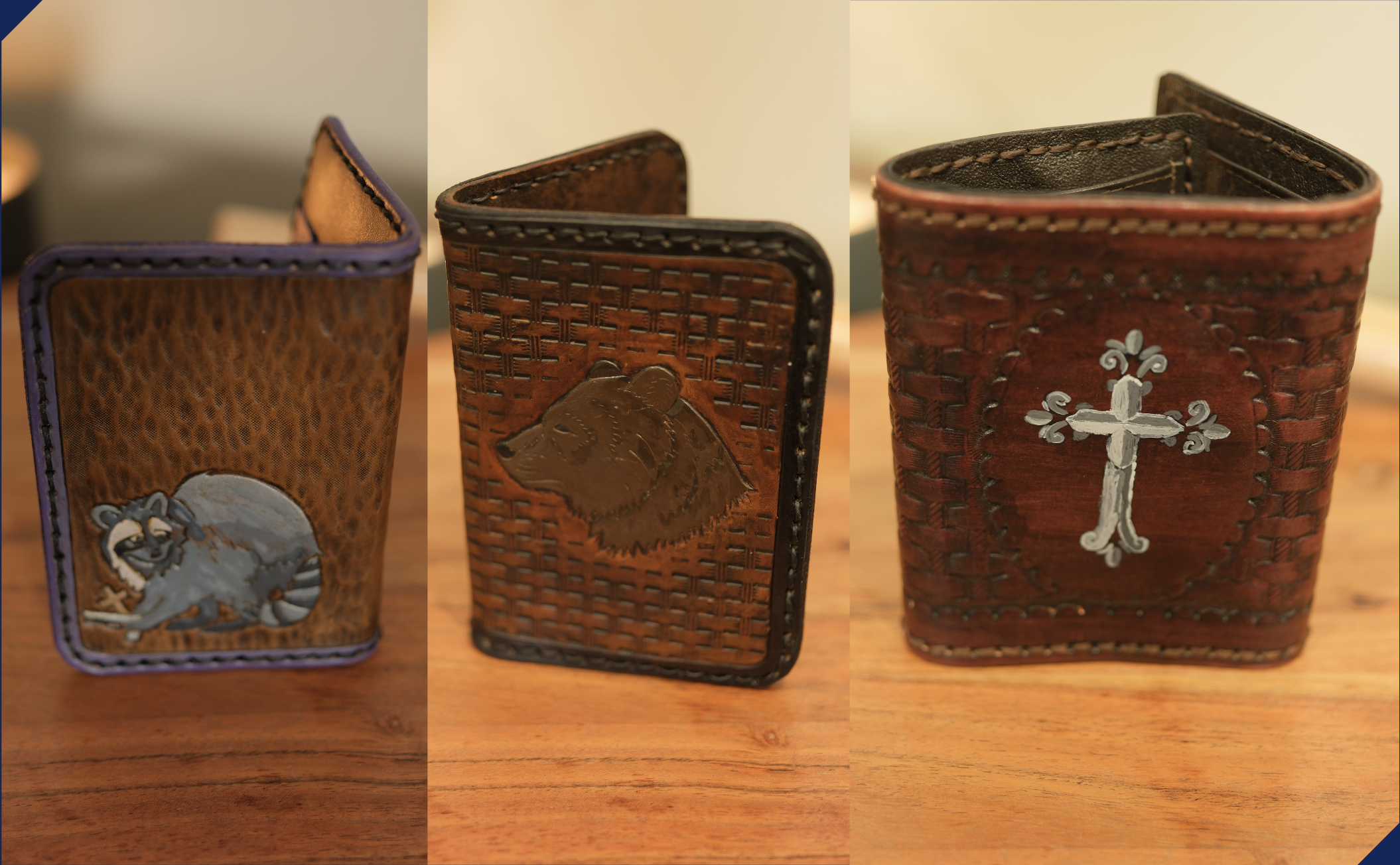 Three wallets displayed upright on a table